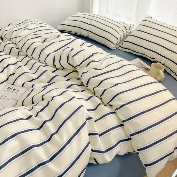 Simple Red and Blue Striped Duvet Cover and Four Piece Bed Sheet Set with Washed Cotton Bedding on the Bed - Image 7